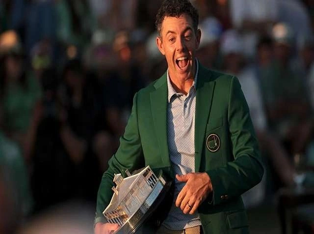 Rory McIlroy celebrates on the 18th green after winning back-to-back Masters titles at Augusta National